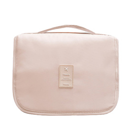 Beżowa damska kosmetyczka podróżna